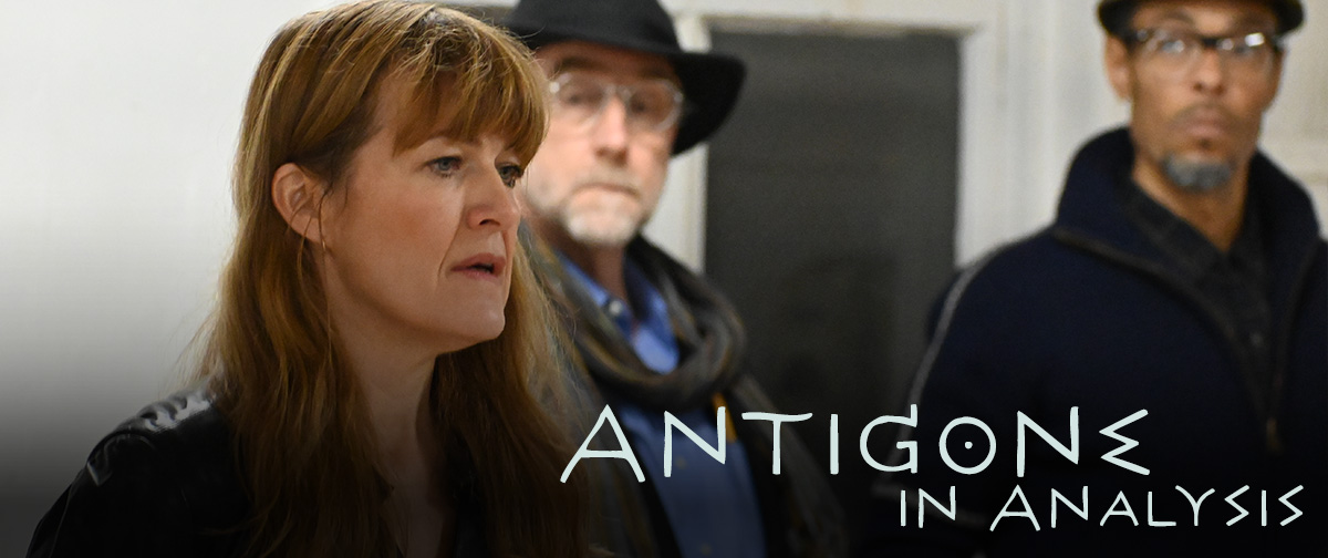 Antigone in Analysis: photo of Annabel Capper as Jocasta in the 2024 reading, Alex Roe and Basil Rodericks watching her in the distance.